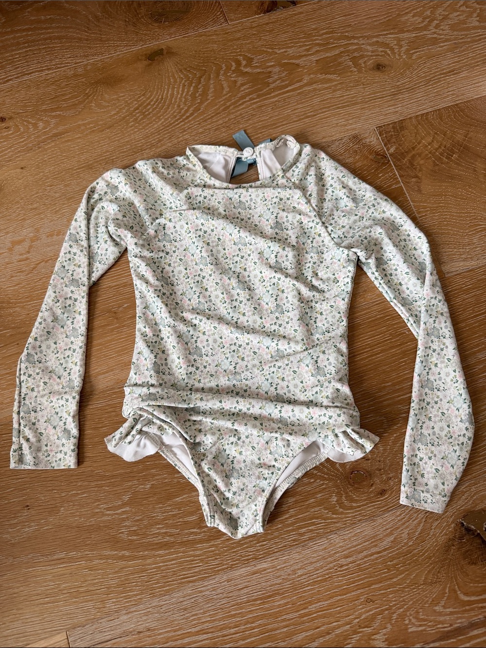 Minnow Girls Long-Sleeve Floral Rash Guard Swimsuit with Bow Tie and Ruffle Side